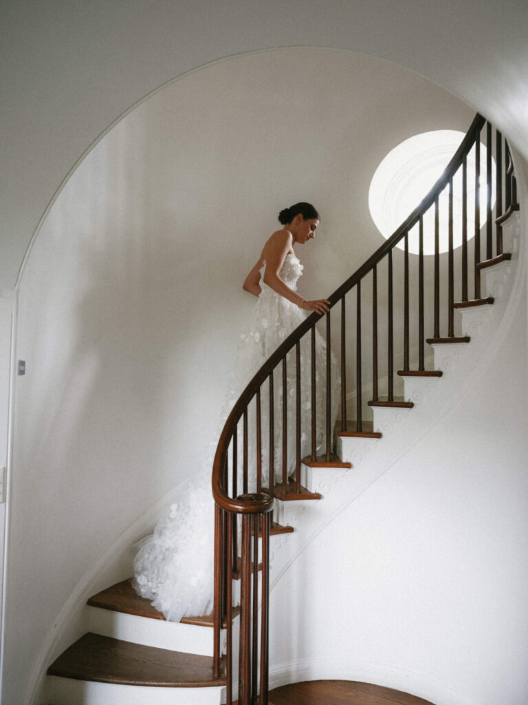 Bride walking up the stairs at Glynwood Farm wedding venue